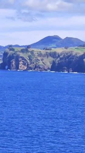 Peaceful coastal afternoon captured near Ponta Delgada, Portugal