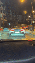 Stuck in Ibiza night traffic behind a white Lamborghini