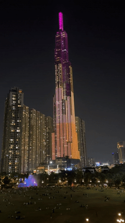 Evening strolls captured along Thủ Đức riverfront promenade