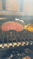 Traditional outdoor cooking session documented in Barcelona