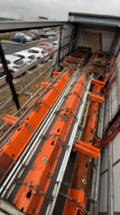 Construction truck with orange materials spotted at Peltre worksite