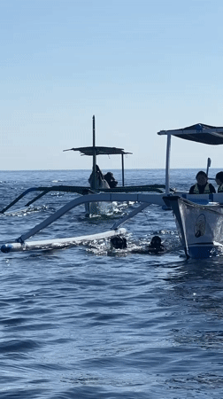 Divers spotted near outrigger boats off Indonesian coast