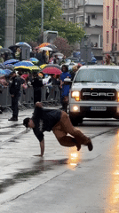 Satirical street parade with political floats draws crowds in rainy Gabrovo