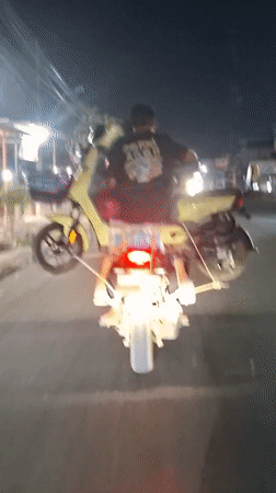 Late-night wheelies and street food in rural Aceh