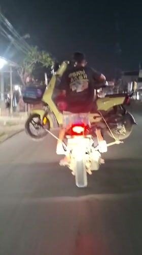 Late-night wheelies and street food in rural Aceh
