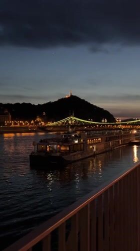 Evening scenes captured along Budapest's illuminated Danube River waterfront