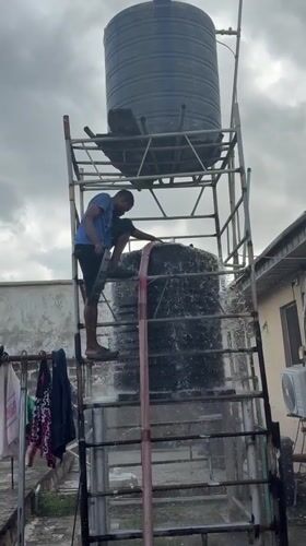 Water tank maintenance and hose storage activities in Ado