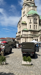 Military event with decorated vehicles at Sofia cathedral plaza