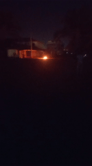 Fire burns in Kaduna, Nigeria during nighttime hours