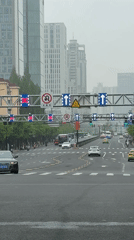 Late night traffic captured at busy Shanghai intersection