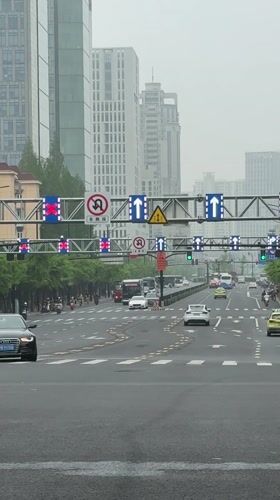 Late night traffic captured at busy Shanghai intersection