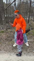 Family outdoor activities observed in Chaikovsky, Russia spring afternoon