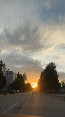 Summer sunset evening across Chaikovsky, Russia