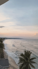Sunset to nightfall along the Phu Thuy coastline, Vietnam