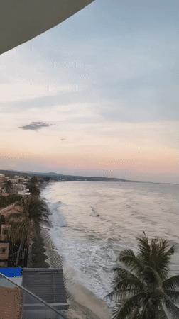 Sunset to nightfall along the Phu Thuy coastline, Vietnam