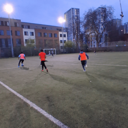 Amateur football match played on artificial pitch in Coventry