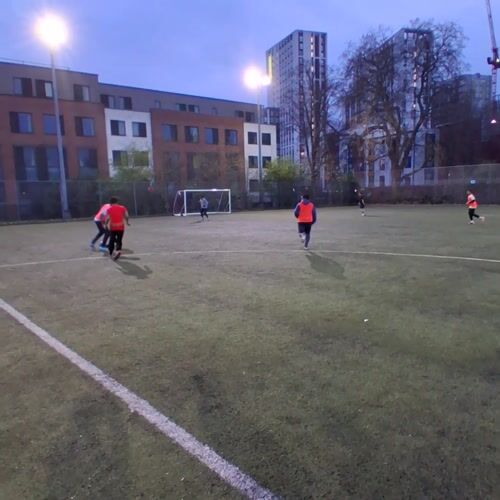 Amateur football match played on artificial pitch in Coventry