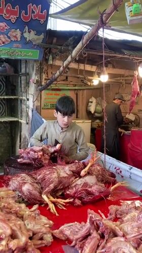 Busy meat market operates in Quetta, Pakistan