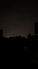 Woman spotted outdoors during urban lightning storm May 17