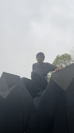 Young man explores Strasbourg climbing structures, visiting urban spots