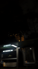 Nighttime building with Bitso ad captured in Mexico City