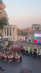 Folk dancers perform at Plovdiv's ancient Roman theatre