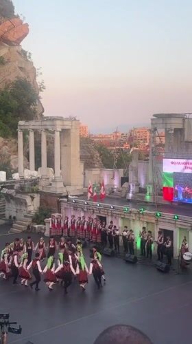 Folk dancers perform at Plovdiv's ancient Roman theatre