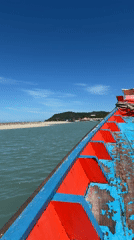 On the water in Baan Thong Krut, boats and coastal scenes