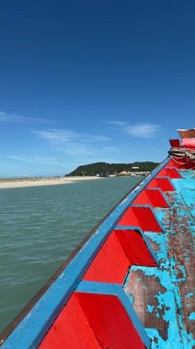 On the water in Baan Thong Krut, boats and coastal scenes