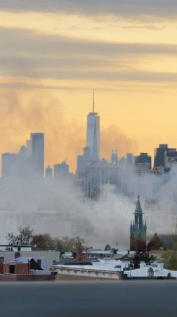 NYC skyline filmed from elevated viewpoint featuring One World Trade