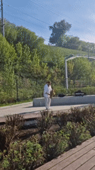 Riverfront activities captured in Perm including street saxophone performance