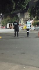 Police officer and civilian observed together in Buenos Aires