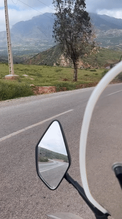 Motorcyclist documents scenic mountain ride through rural Morocco