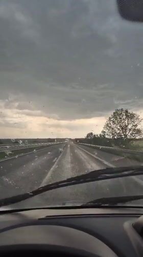 Driver navigates rainy highway conditions in Orizovo, Bulgaria