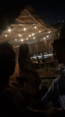 Late night rooftop pool gathering captured in Playa del Carmen