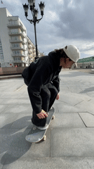 Skateboarders Practice Tricks at Yekaterinburg Plaza