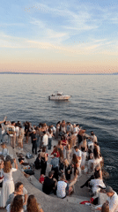 Evening gathering draws dozens to Rijeka waterfront at sunset