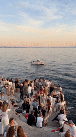 Evening gathering draws dozens to Rijeka waterfront at sunset