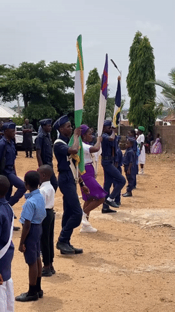 Flag-bearing march in navy uniforms, Jos, Nigeria
