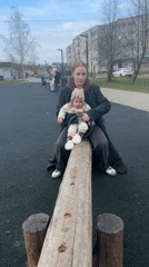 Mother and baby enjoy playground time in Pokrov, Russia