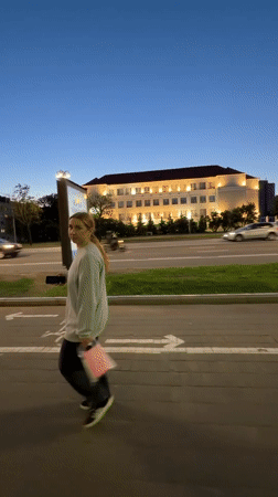 Evening street life documented across central Minsk landmarks