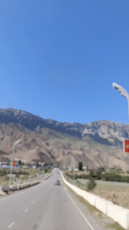 Road and river scenes through Naryn's rugged mountain landscape