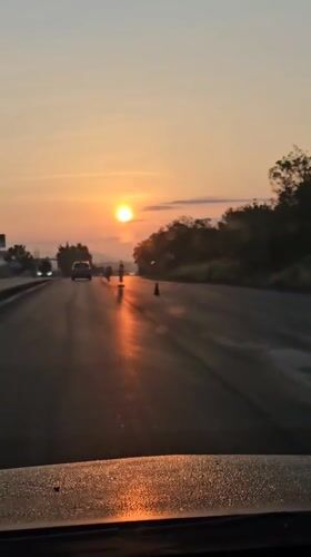 Golden hour traffic scene captured on Bulgarian highway