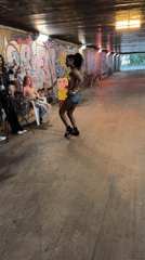 Dancing in a graffiti underpass in Paris