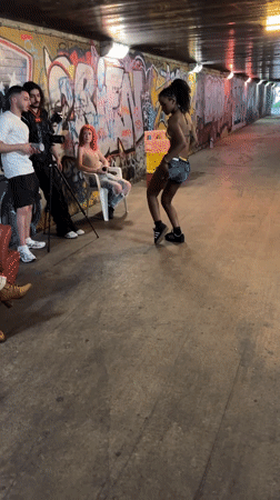 Dancing in a graffiti underpass in Paris