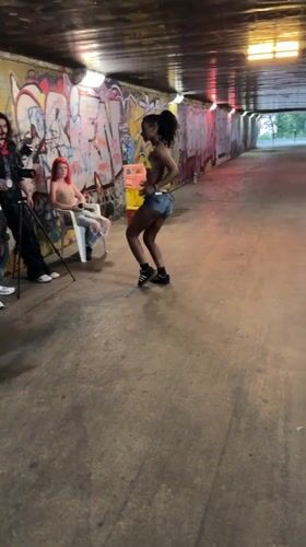 Dancing in a graffiti underpass in Paris