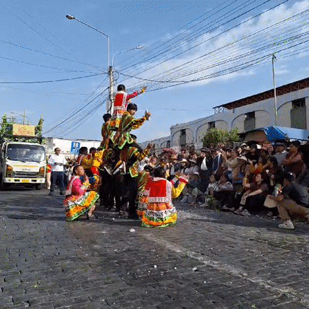 Traditional dancers perform colorful street parade in Arequipa, Peru