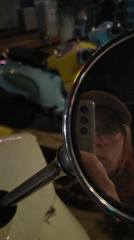 Person documents ice cream treat in Budva, Montenegro