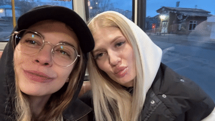 Two women ride public transport in Ust-Ilimsk, Russia