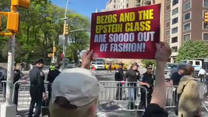 Daytime protest documented on NYC's Museum Mile amid sunny weather